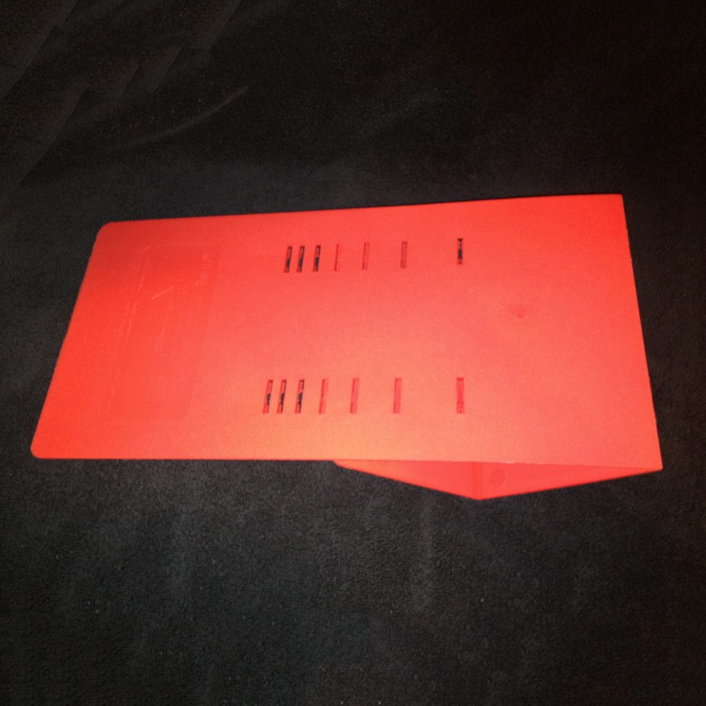 Pizza leveler. Plastic shim for making a level surface