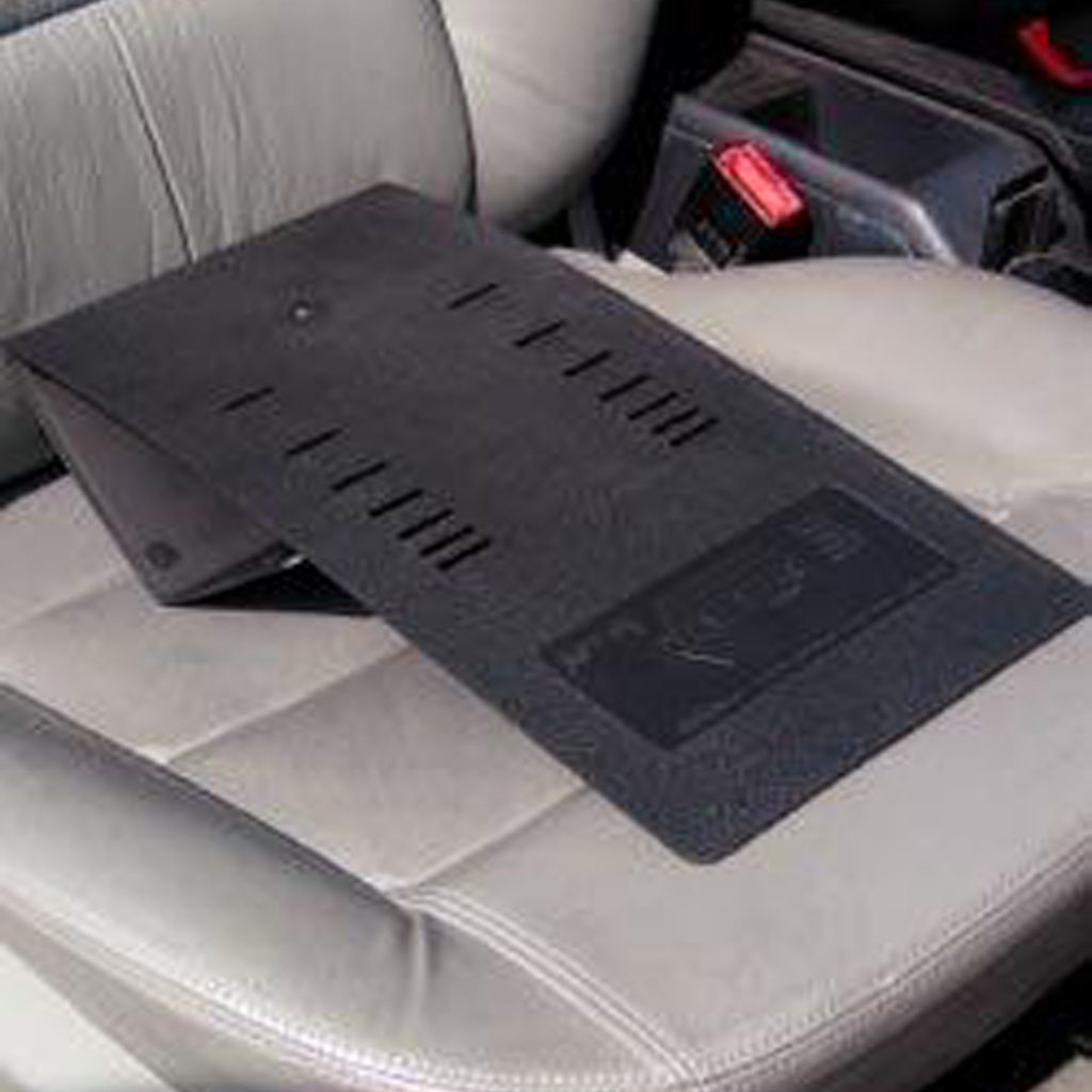 Pizza leveler in action. Level surface on car seat